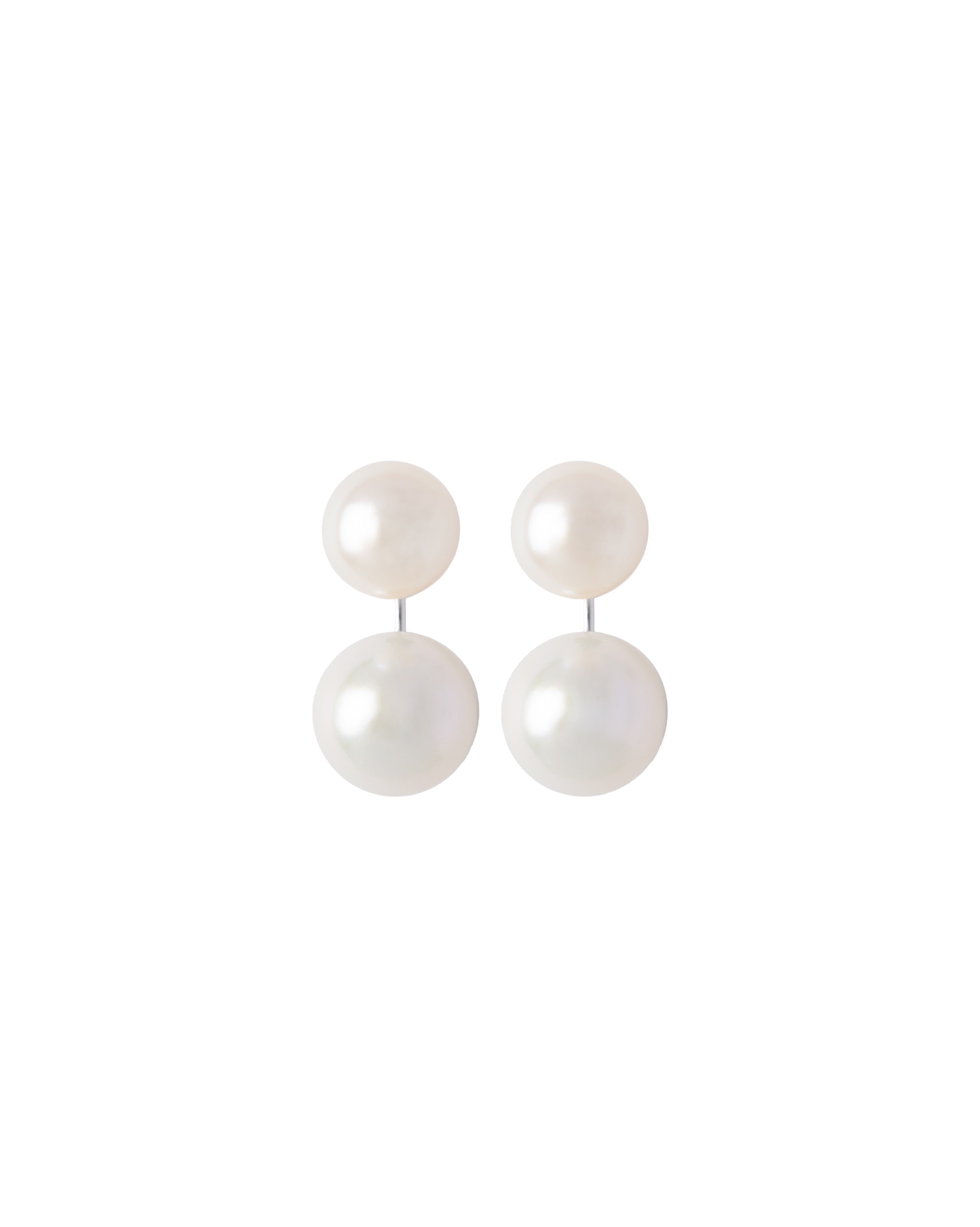 A simple pearl earrings with rhodium-plated posts, designed to be worn as simple studs or with an additional larger pearl for a bolder look.