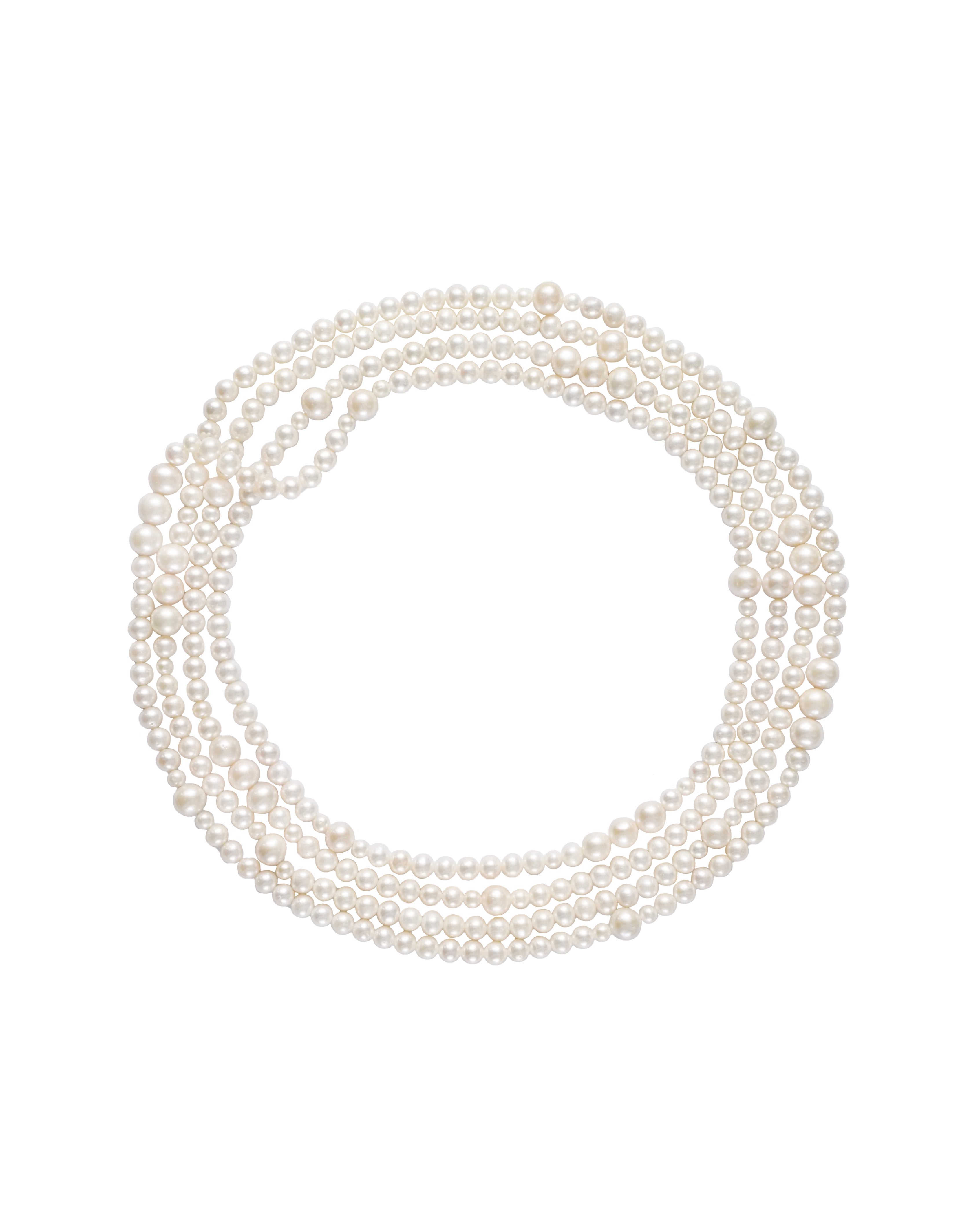 A long strand of freshwater pearls in varying sizes | Pearl Necklace