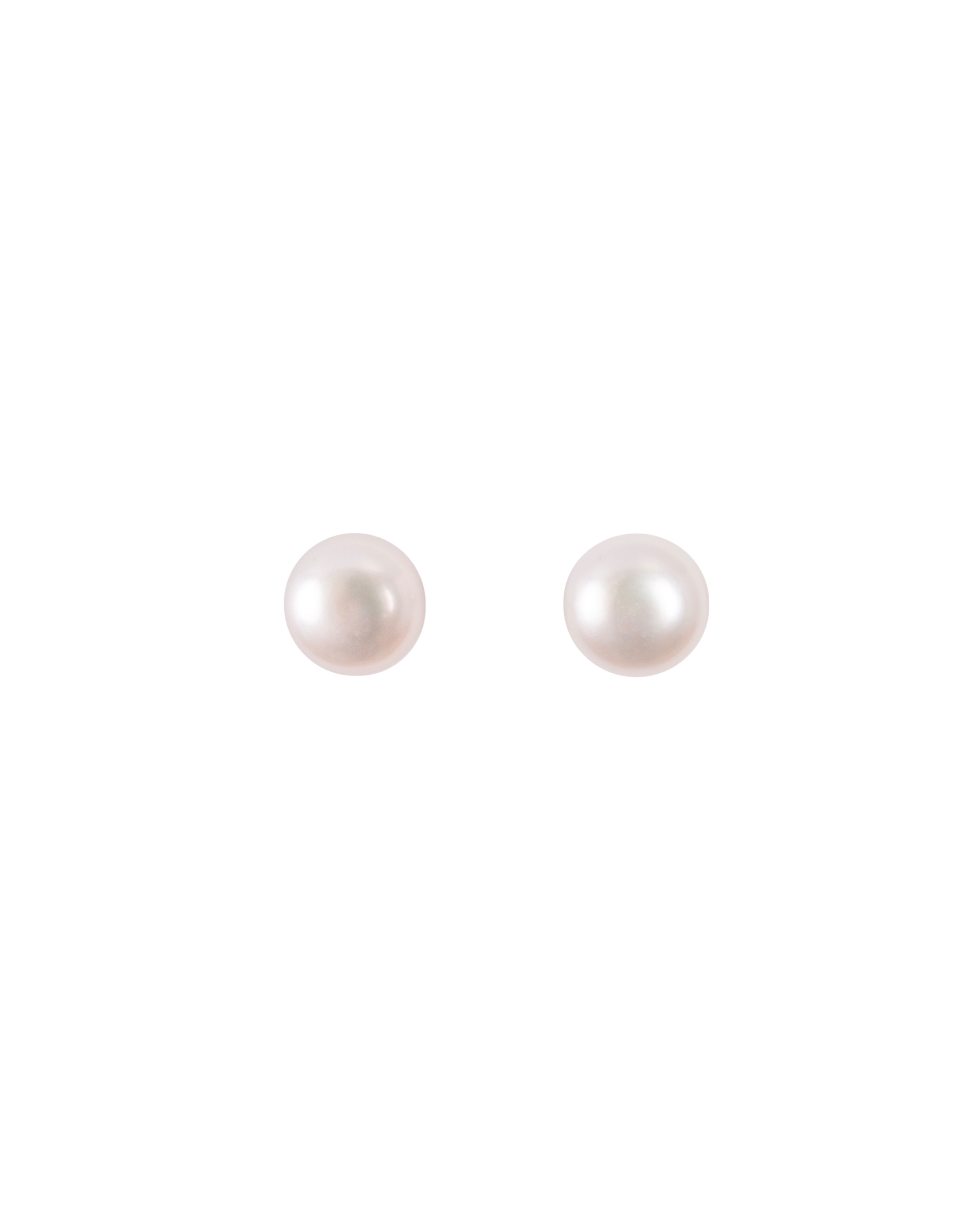 A pair of everyday pearl earrings with sterling silver posts on a white background.