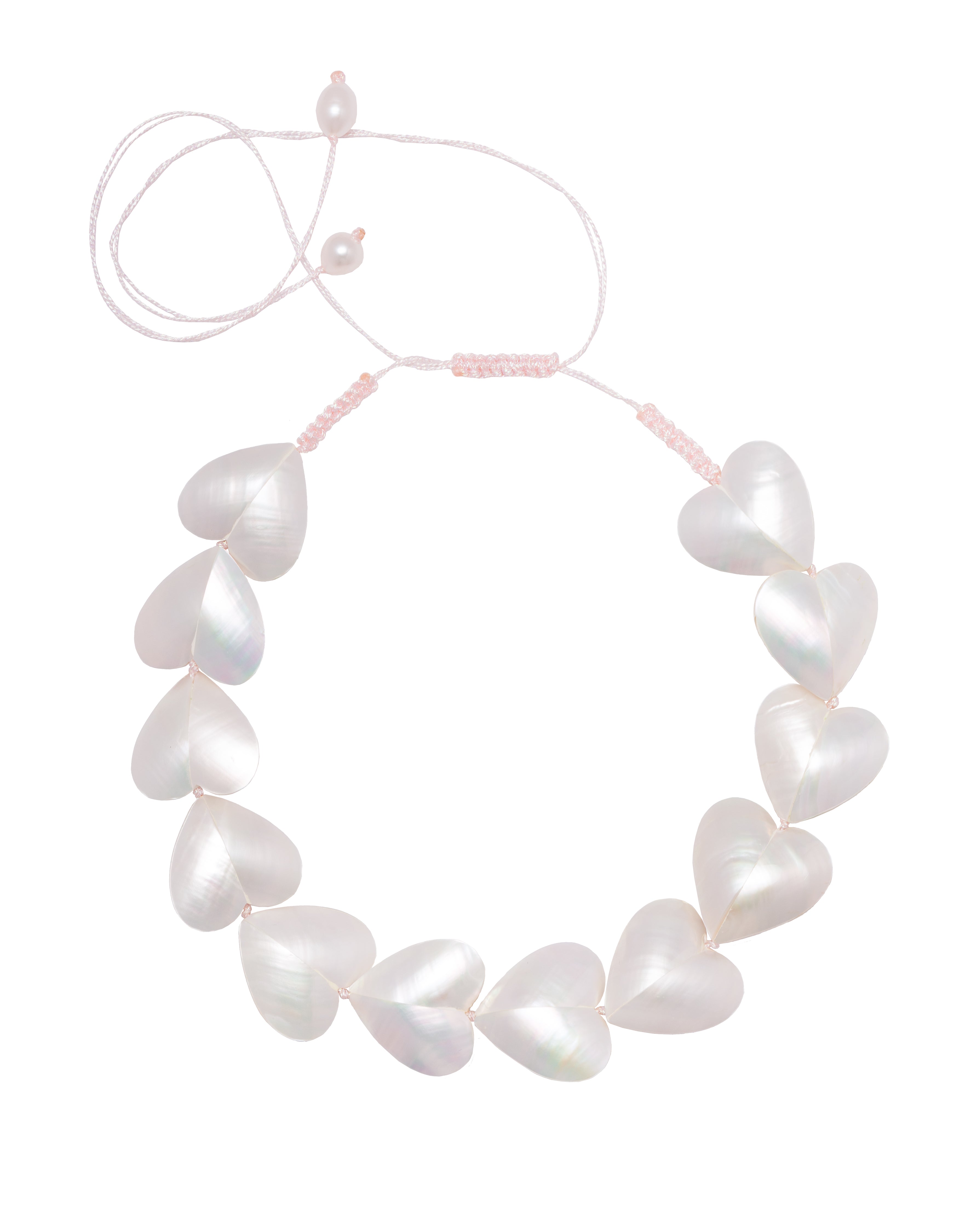 A necklace with heart-shaped shells and freshwater pearls .