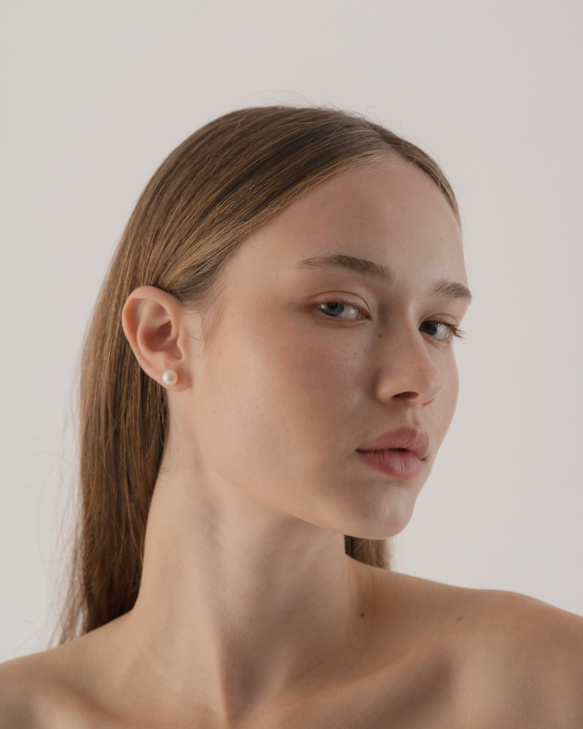 Woman with a plain background